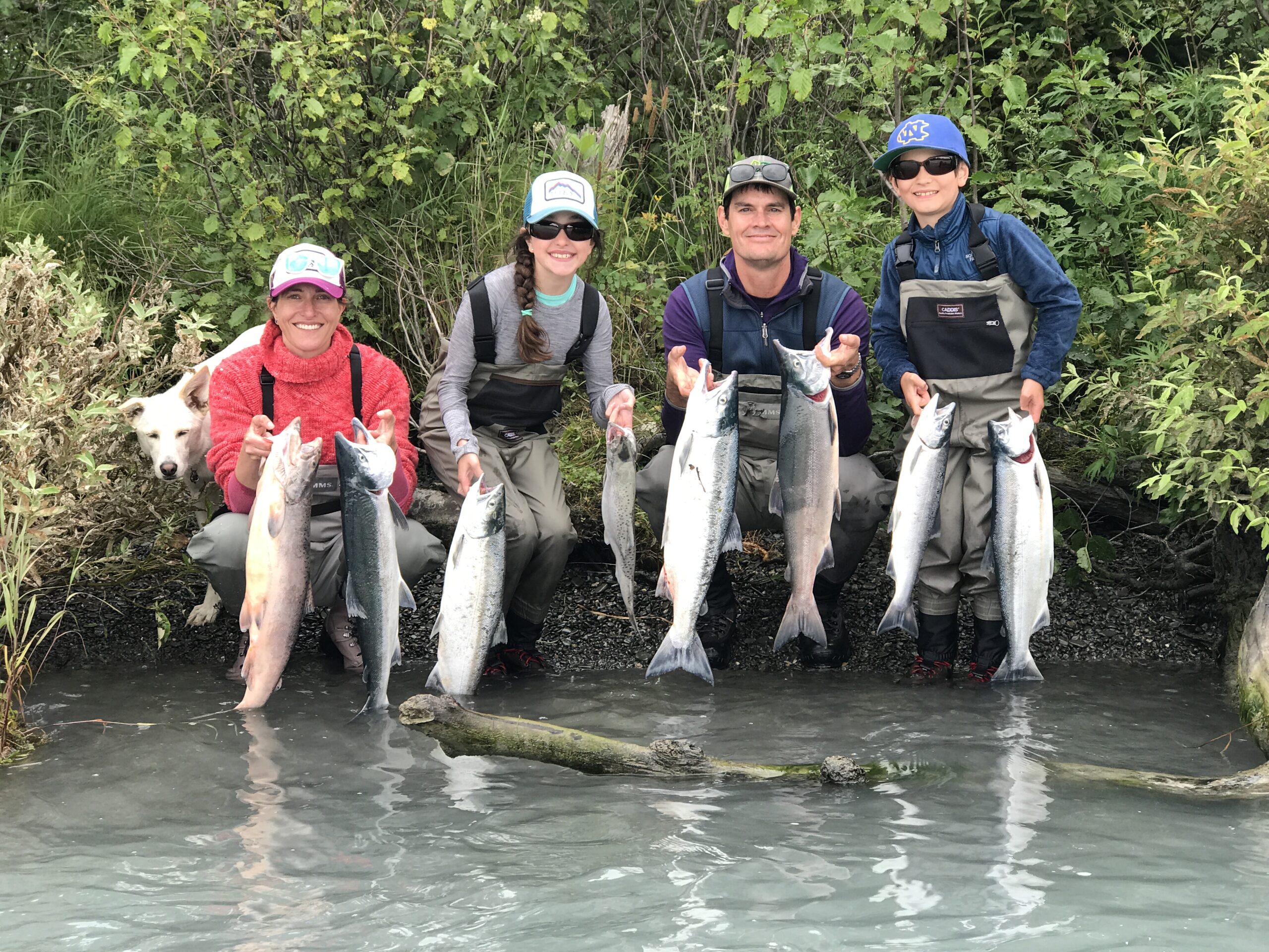Family with sockeye salmon limits on the Kenai River